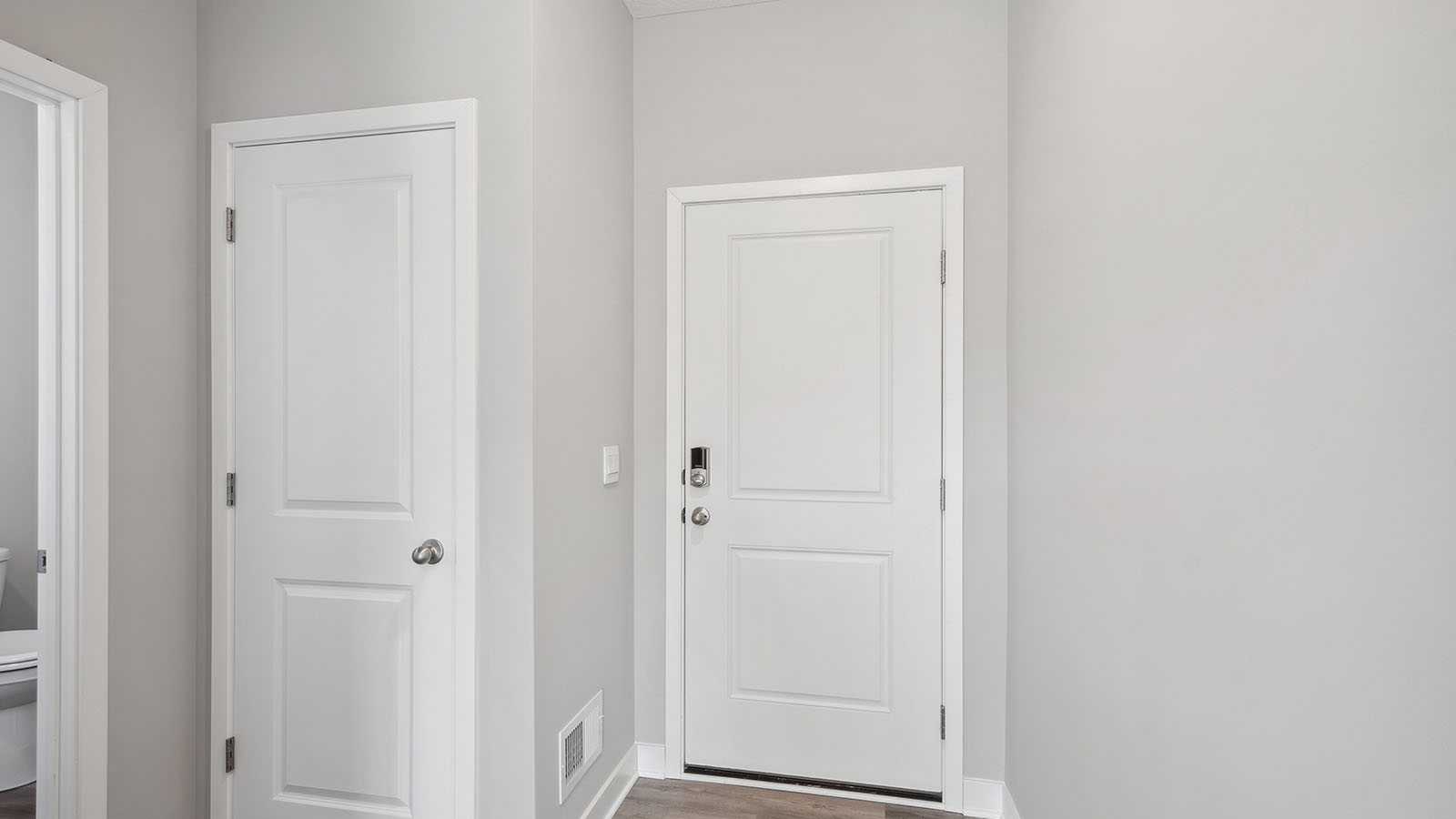 Front Door view from the foyer, entry hall inside front door, near office, or flex room adding a direct line of sight to home