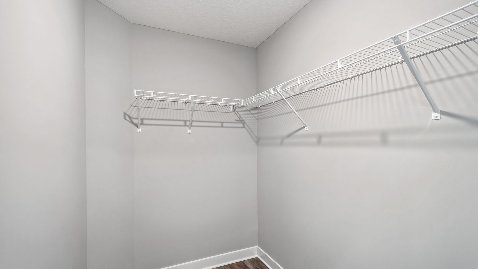Owner’s ensuite adds quality storage inside this walk-in closet, designed for functional privacy