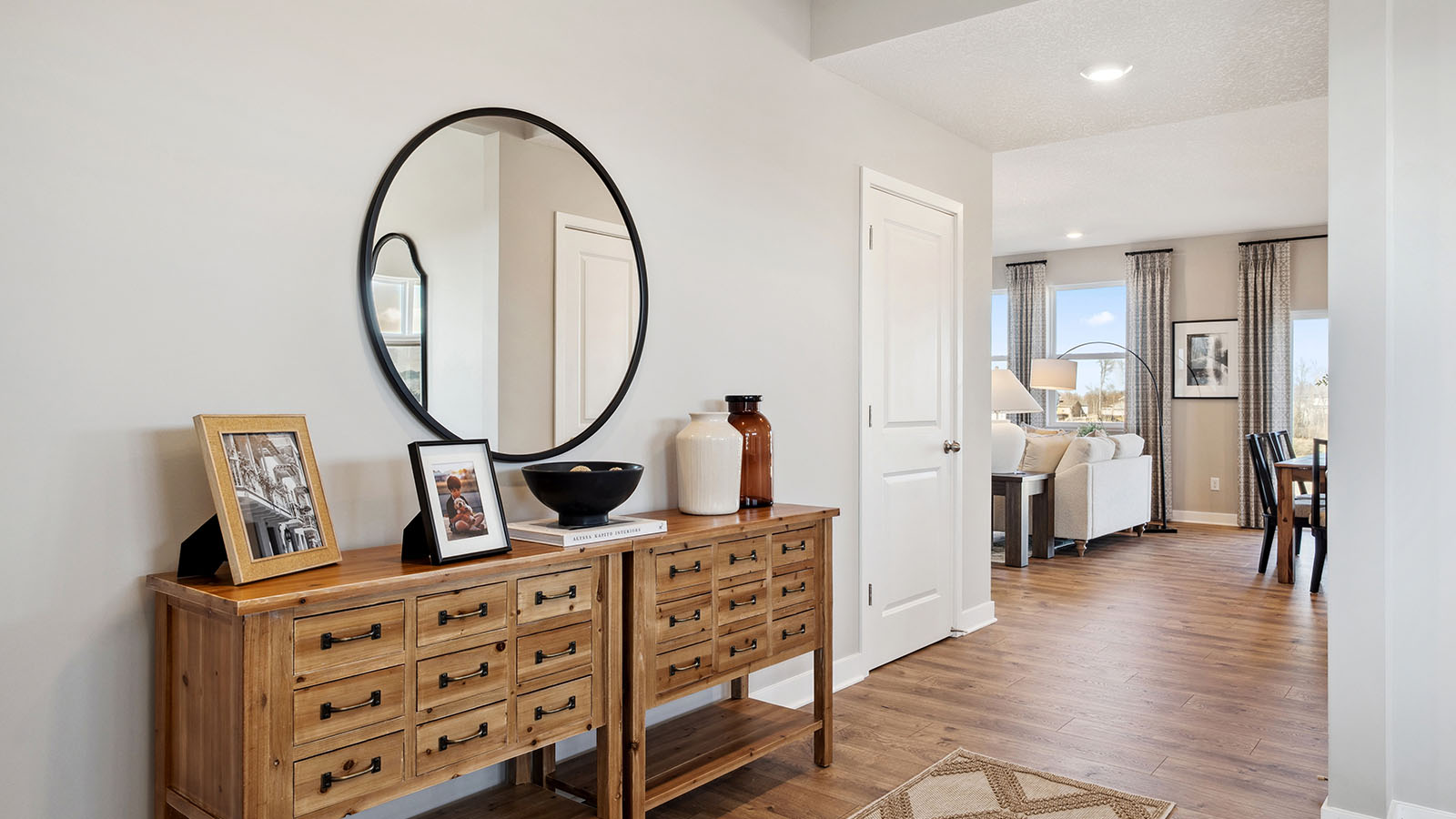 Entry hallway inside front door adds a welcoming front with direct line of sight to main living areas