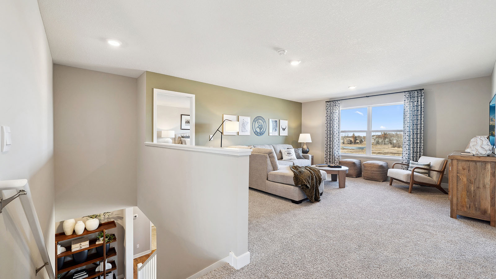 Upstairs loft adds multi-use space connecting bedrooms and family bathroom