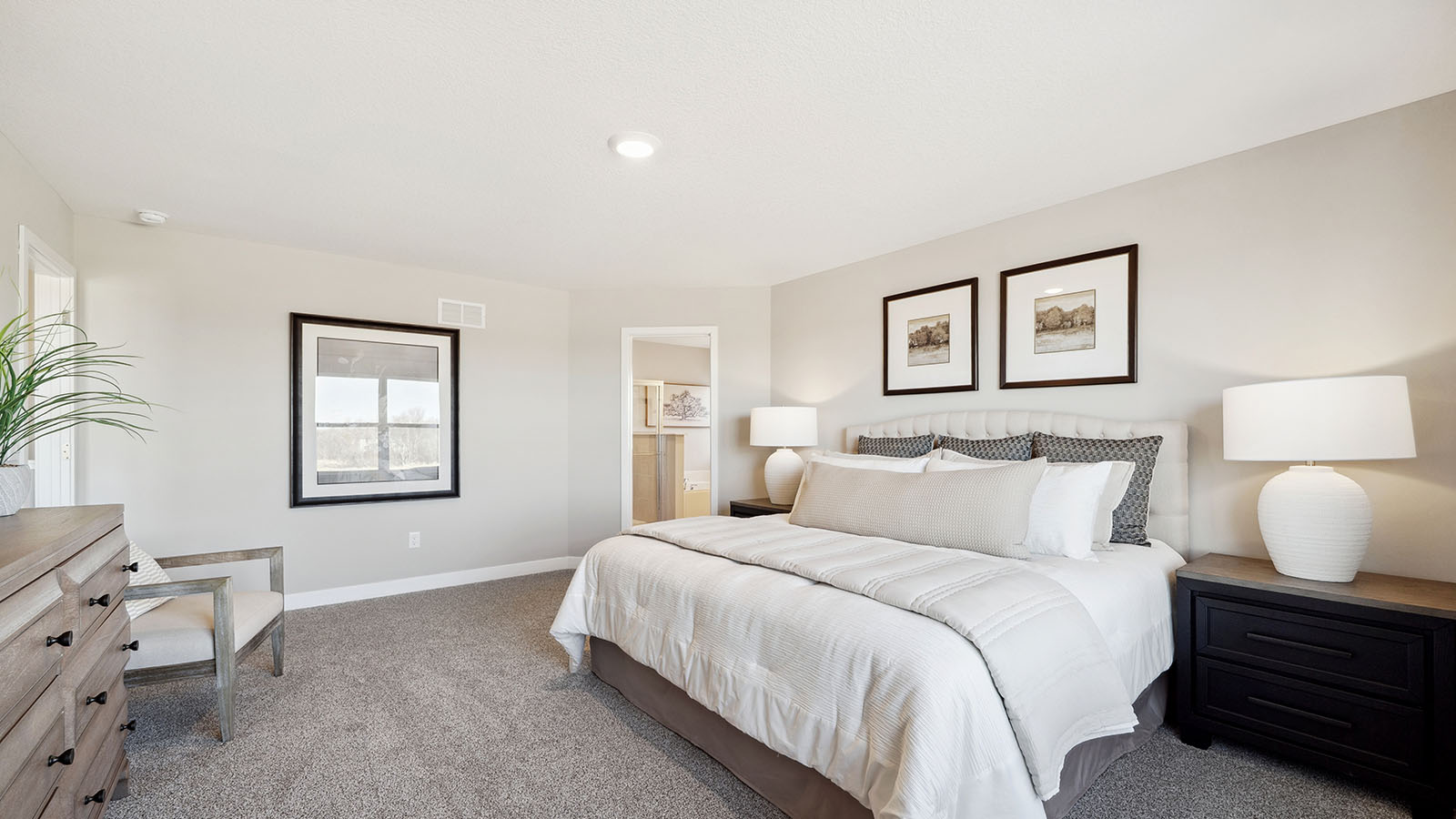 Primary bedroom designed for privacy and style adding a spa-inspired ensuite bathroom and walk-in closet