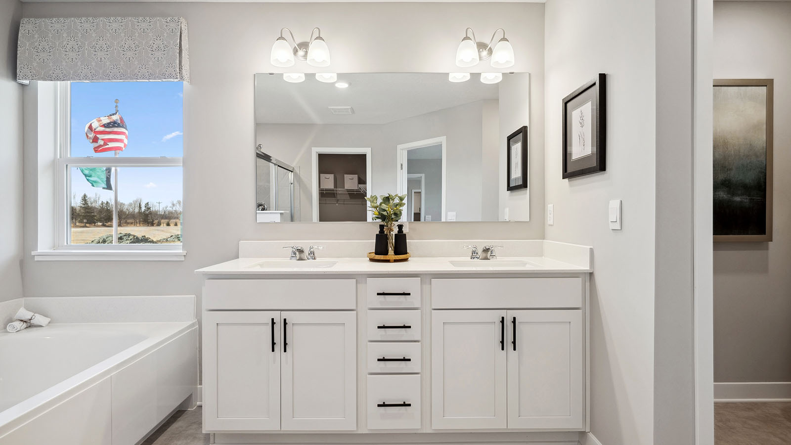 Owner’s ensuite adds stylish appeal, spa-inspired designs with double vanity and soaking tub