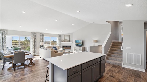 Open floor plan with vaulted ceilings.