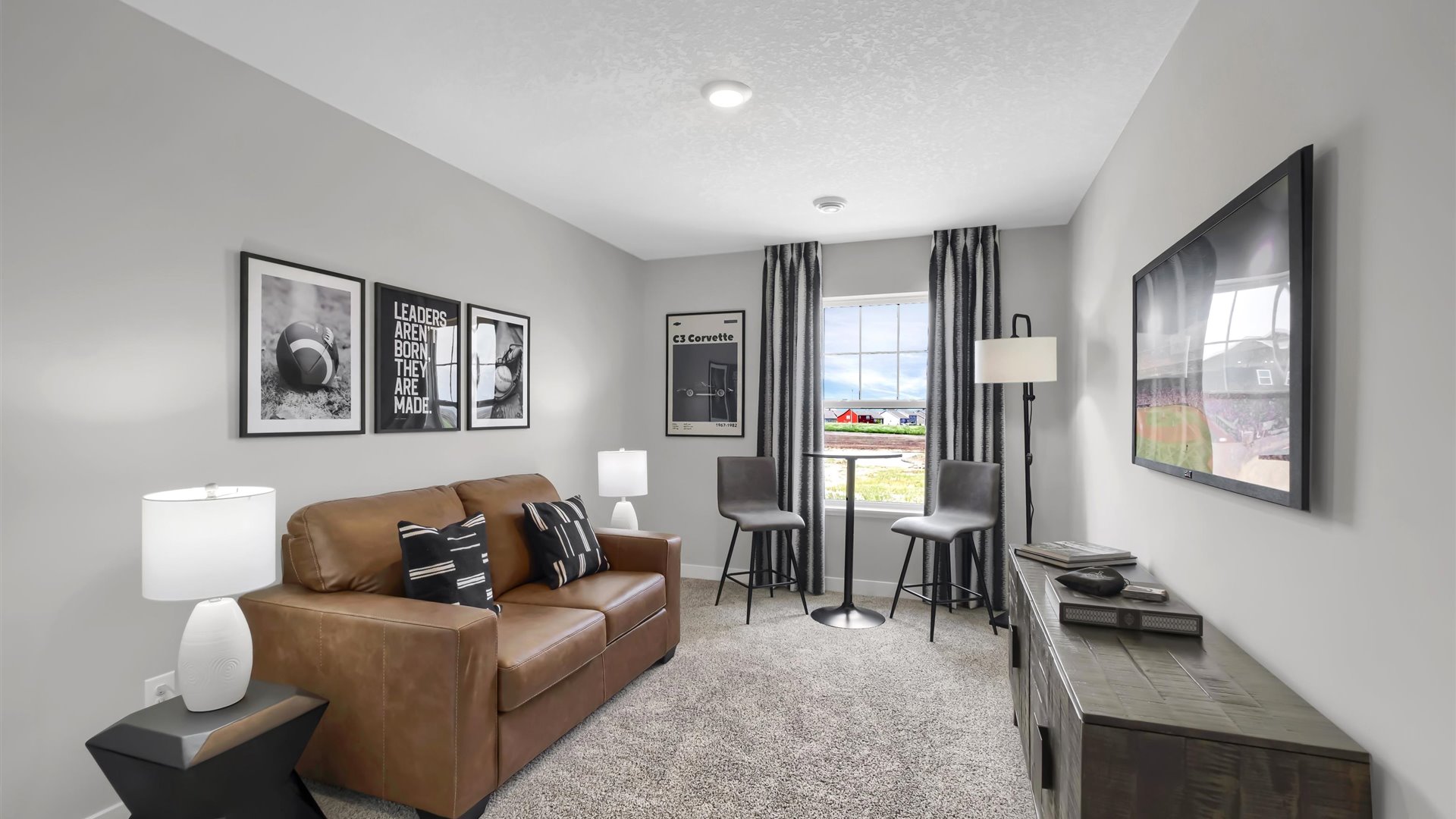 Carpeted upper level loft area.