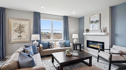 The family room has an electric fireplace.