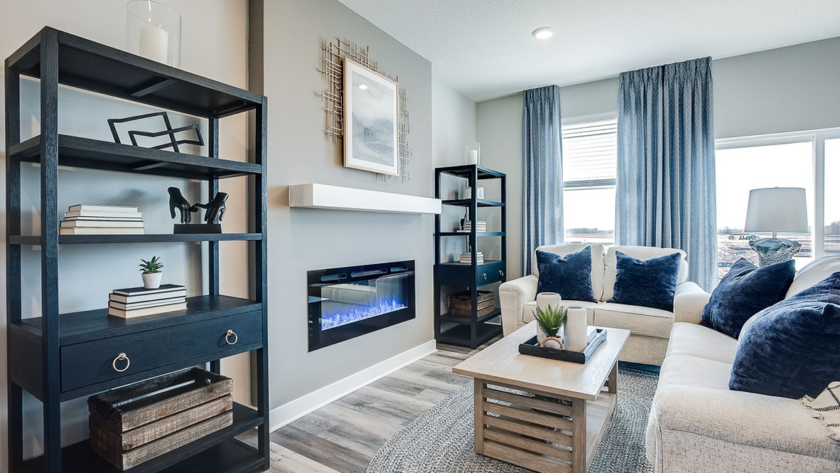 family room with electric fireplace.