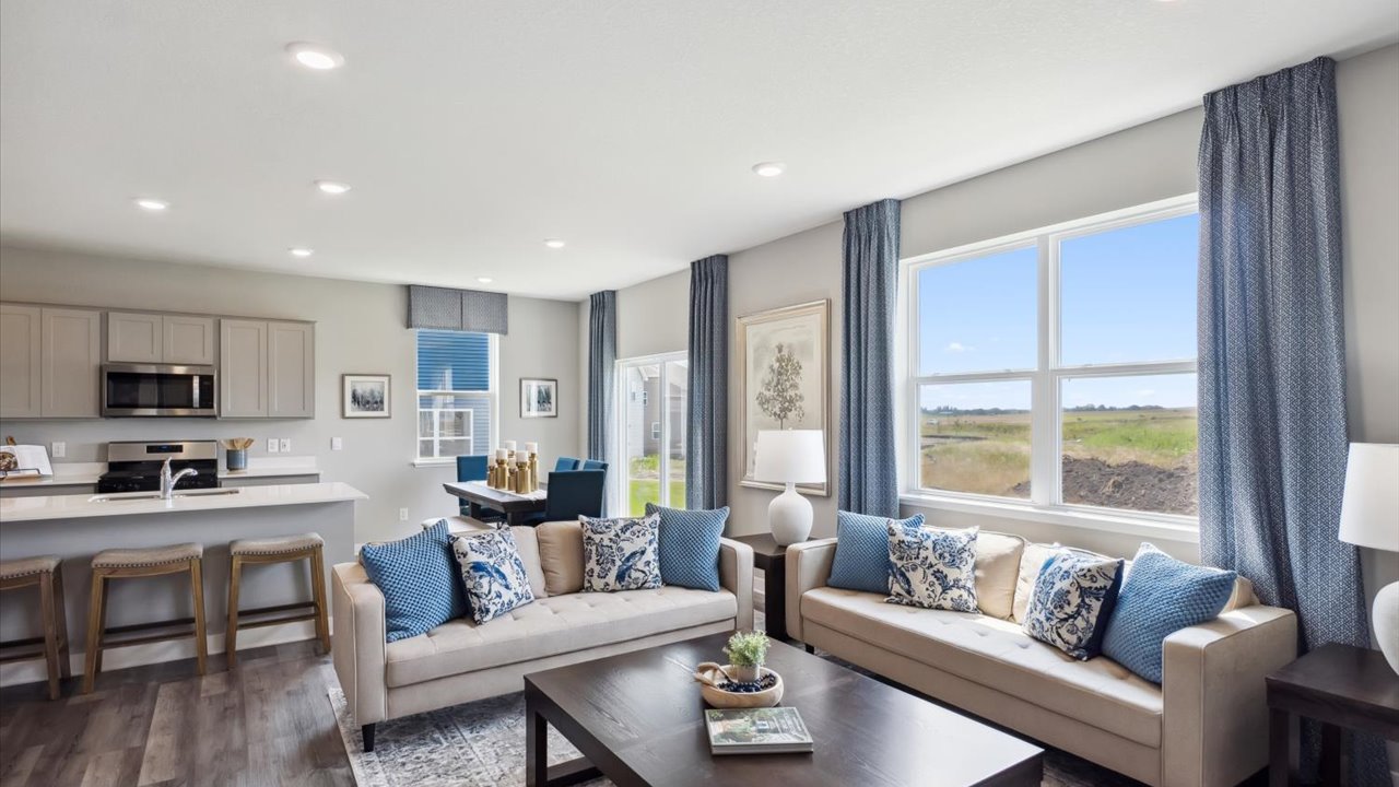 Main level with the family room, dining and kitchen.