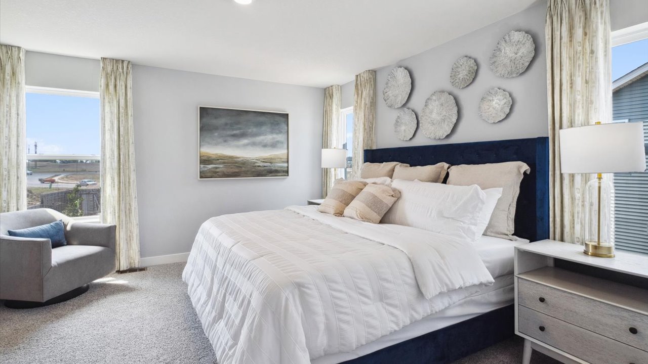 Upper level bedroom suite with private bath and walk in closet.