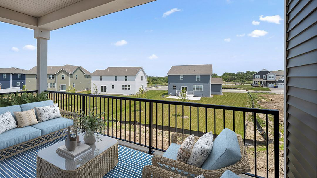 Covered deck staged with outdoor furniture