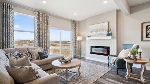 Family room with electric fireplace.