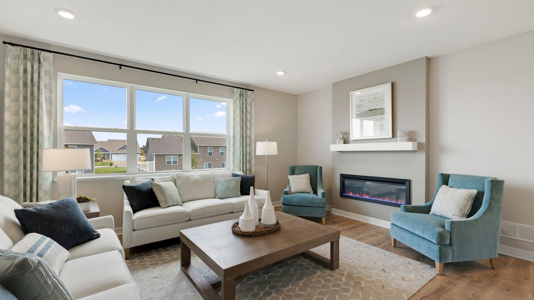 Family room with electric fireplace.