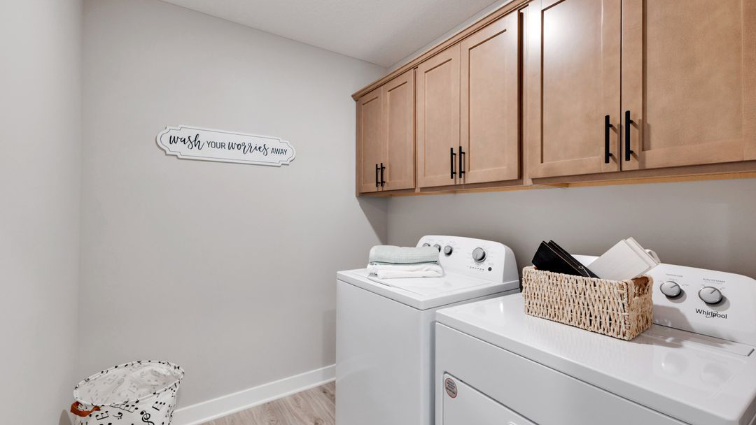 Upper level laundry with optional cabinets.