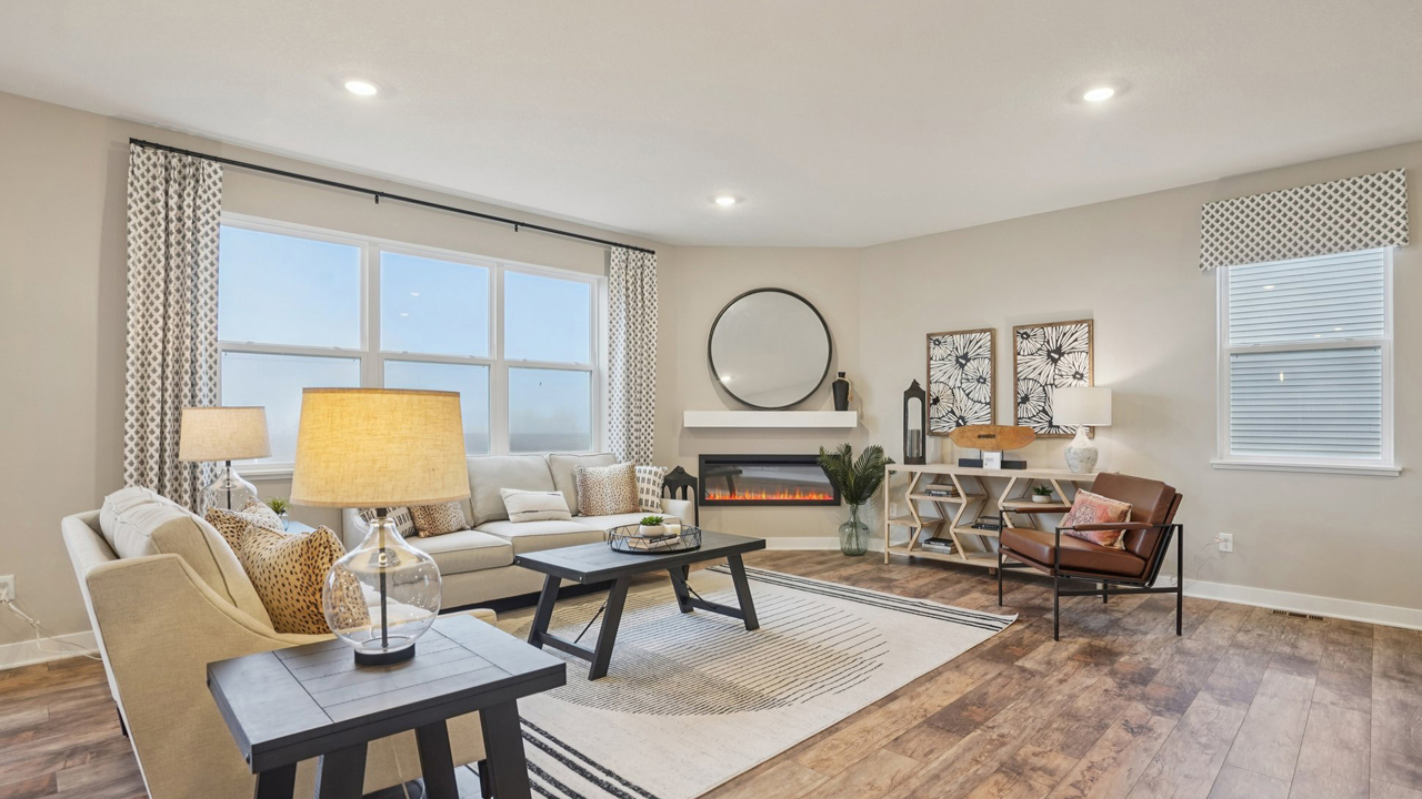 Family room with modern electric fireplace.