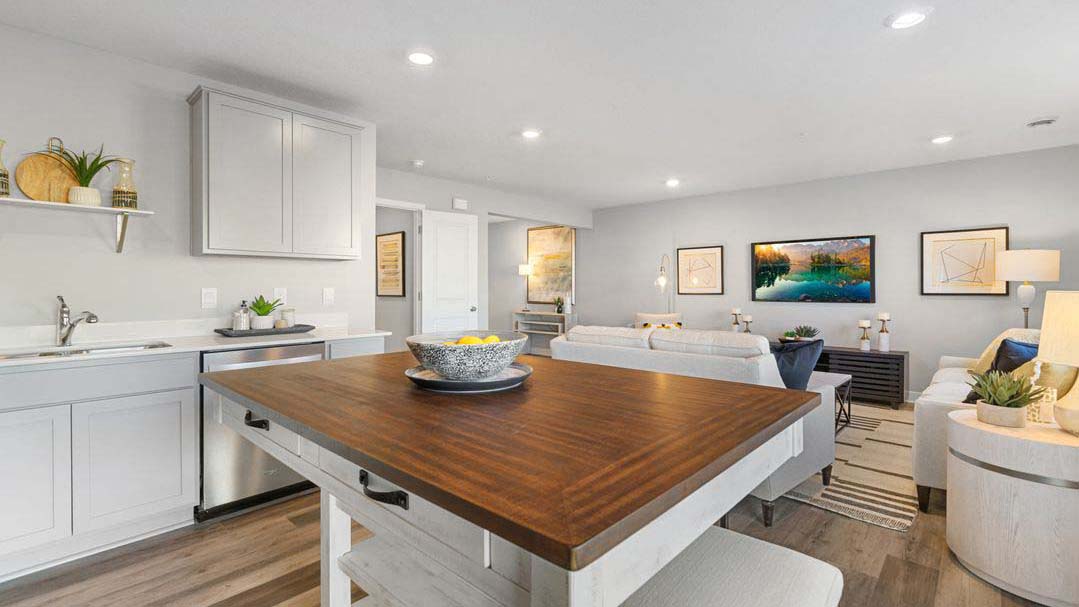 View of open concept main level from kitchen area.