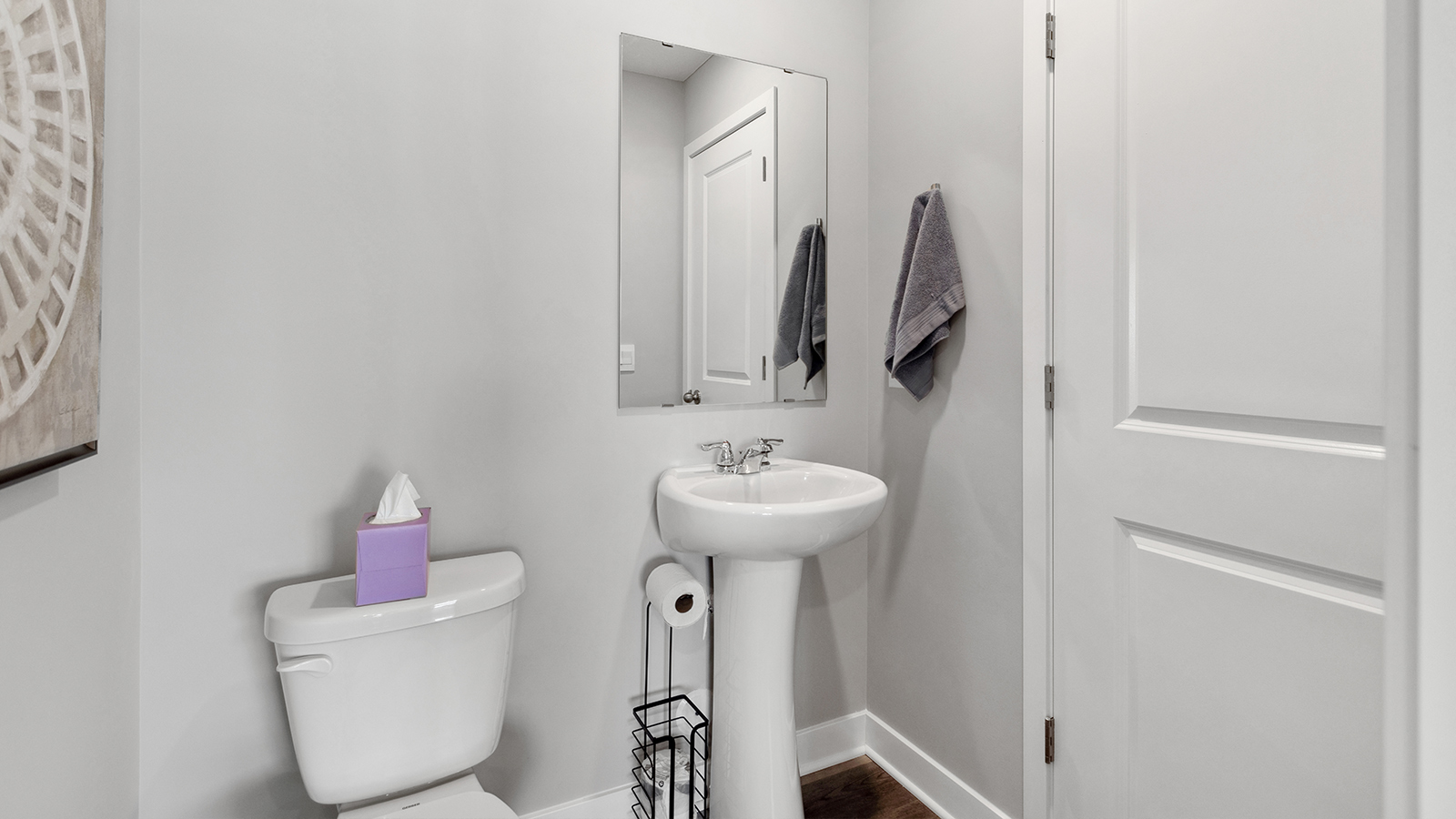 Main level half bathroom.