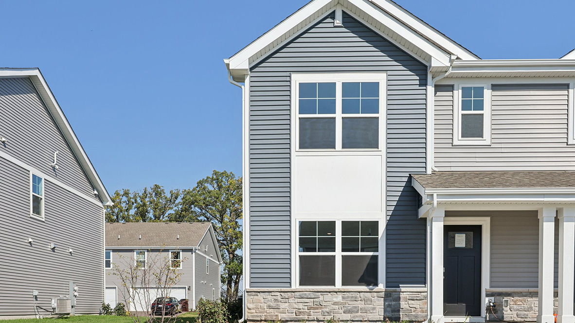 condo duple exterior with vinyl siding