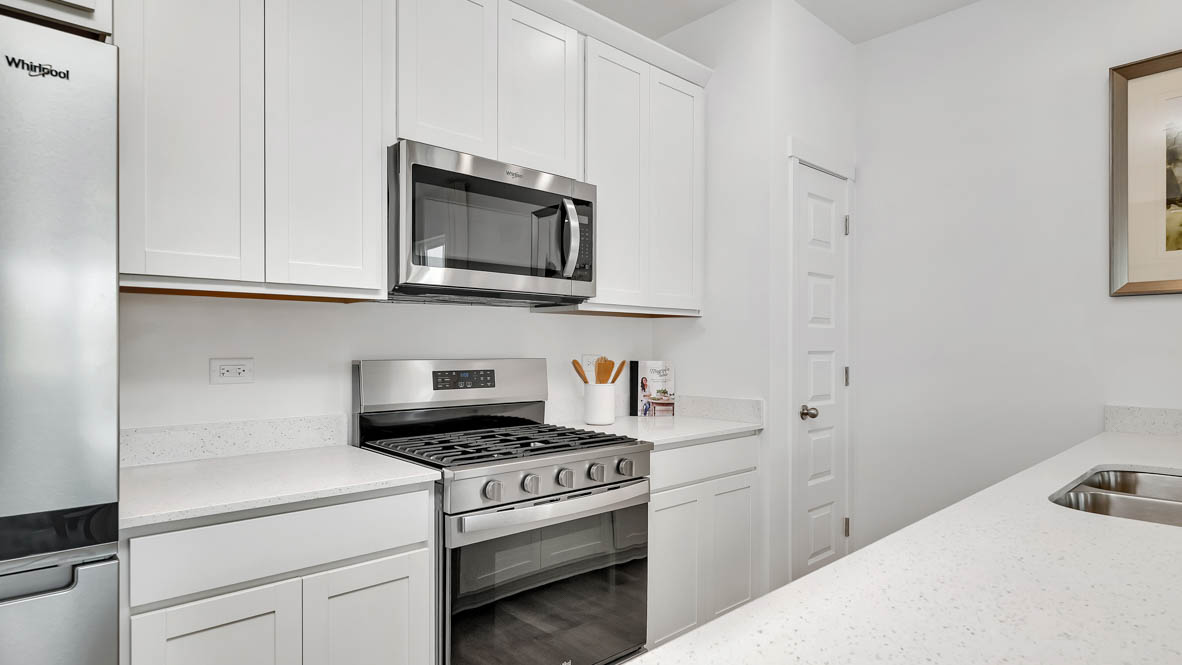 Kitchen with peninsula island from wall