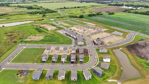 Pike river crossing ariel view of community