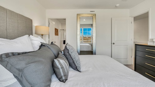 Primary bedroom with connecting en suite