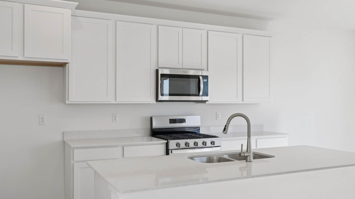 Kitchen island with sink and dishwasher