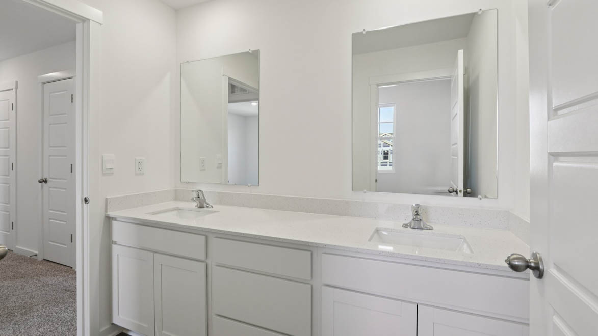 Secondary bathroom with dual sinks