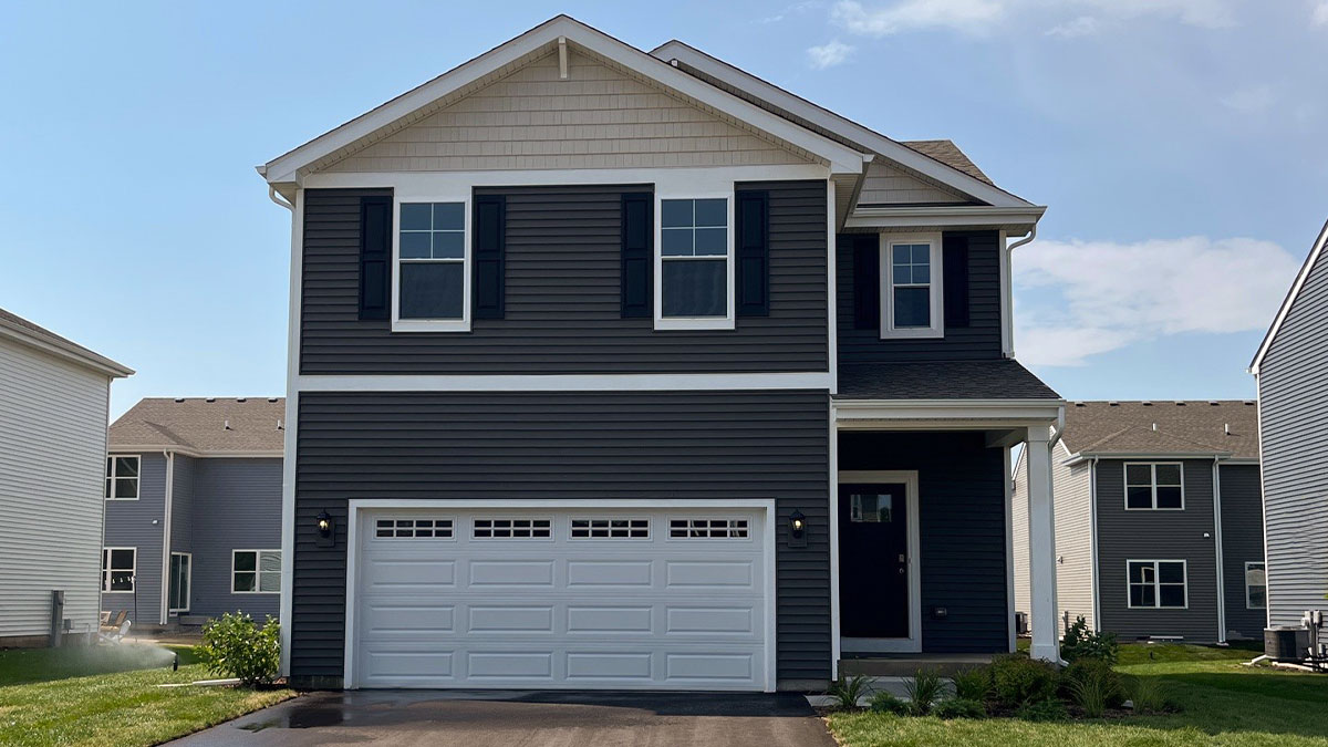 two-story single family home with smoky ash siding