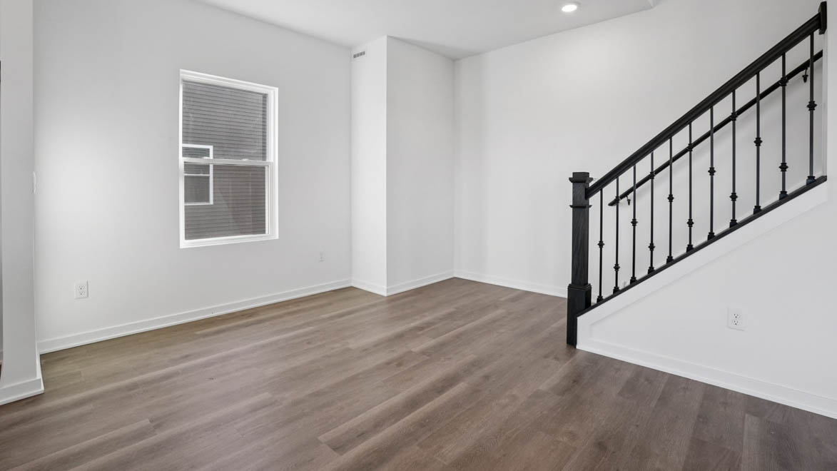 Dining room with staircase leading up
