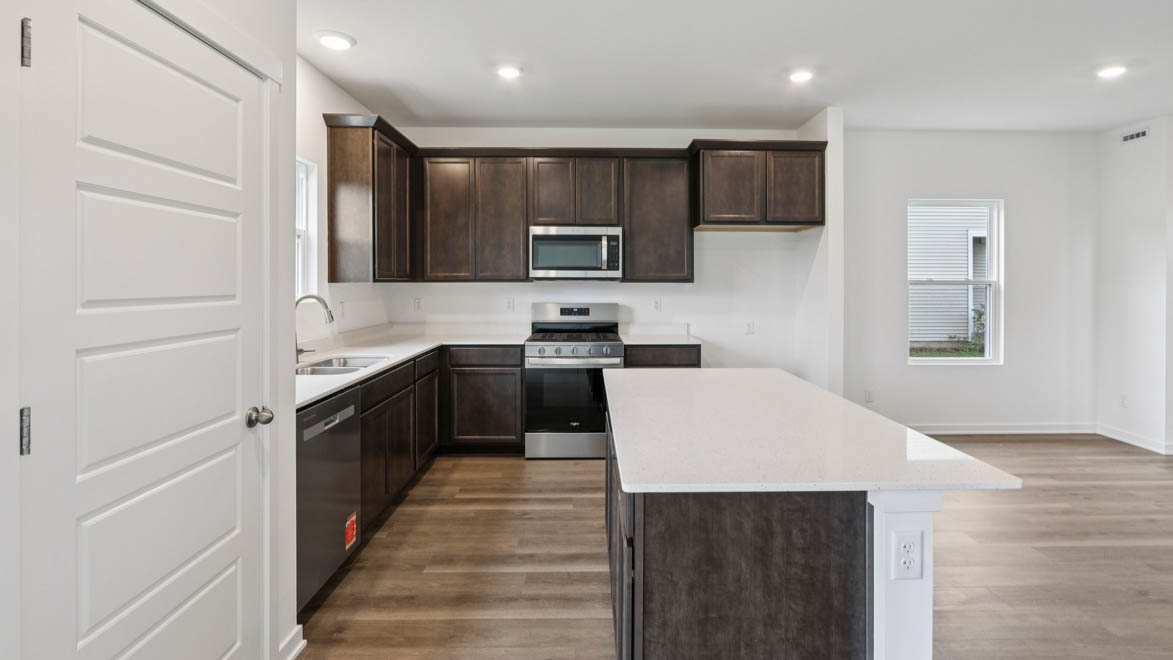 Kitchen with island over hang perfect for seating