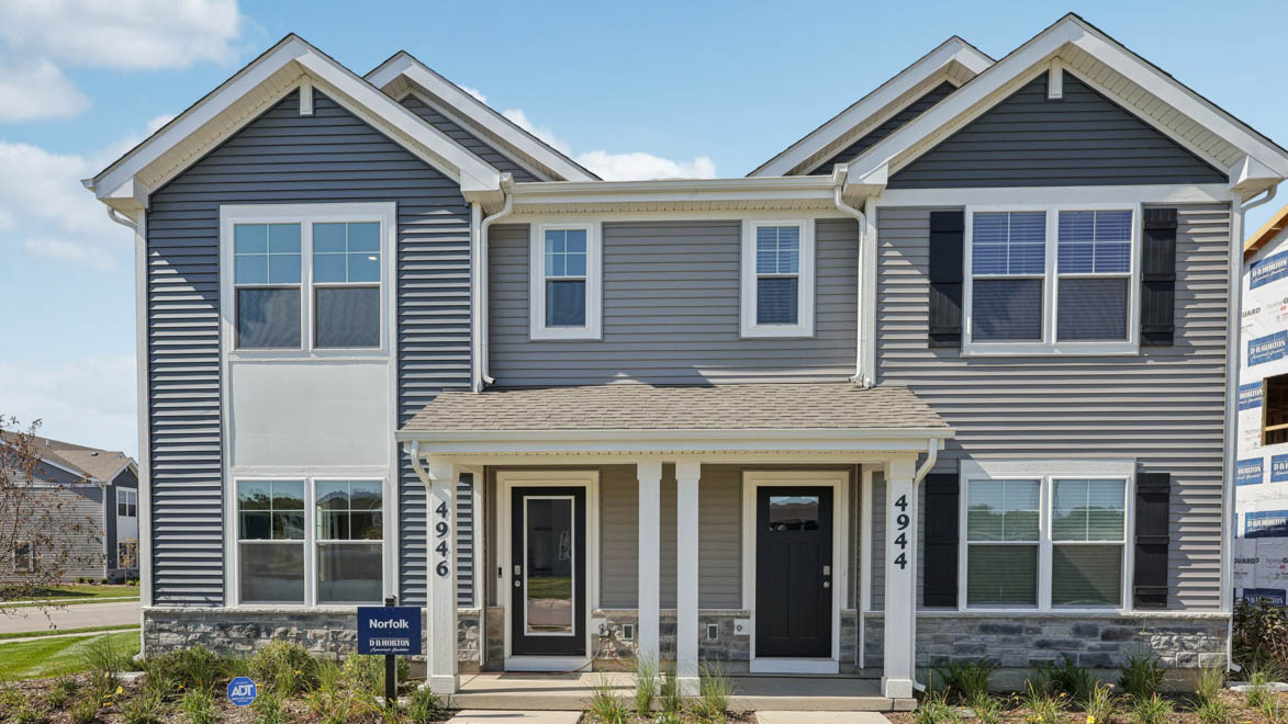 Two story duplexes with vinyl siding