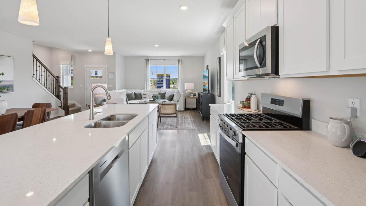 open concept kitchen with stainless steel appliances