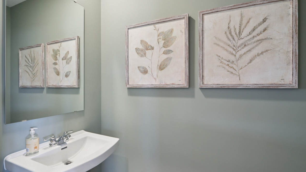 Half bathroom with single bowl vanity