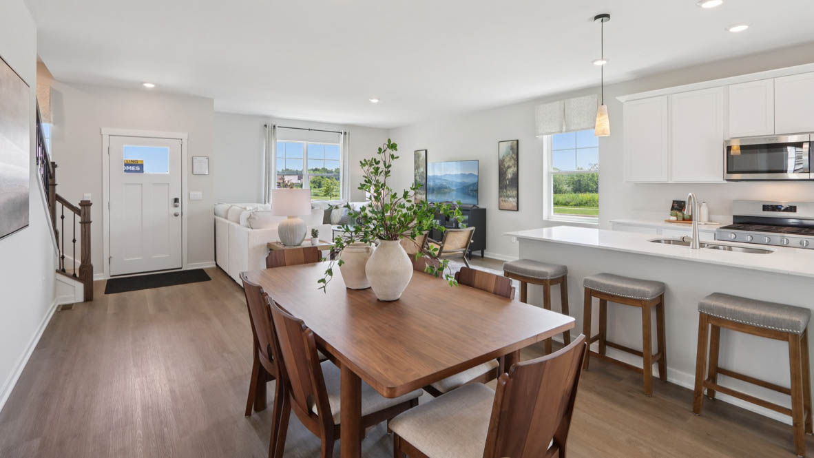 Interior dining area open to kitchen with center island