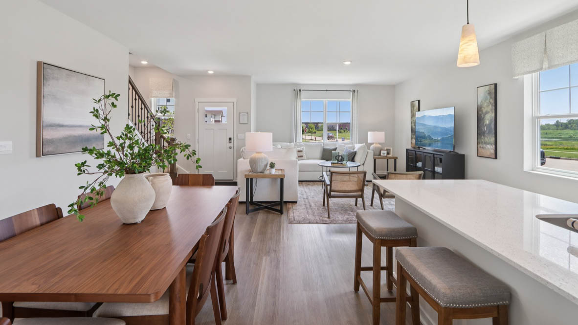 Interior dining area open to kitchen with center island