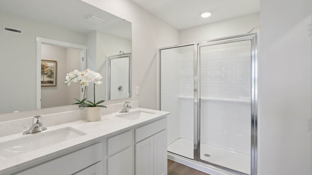 Interior bathroom with double sink and shower