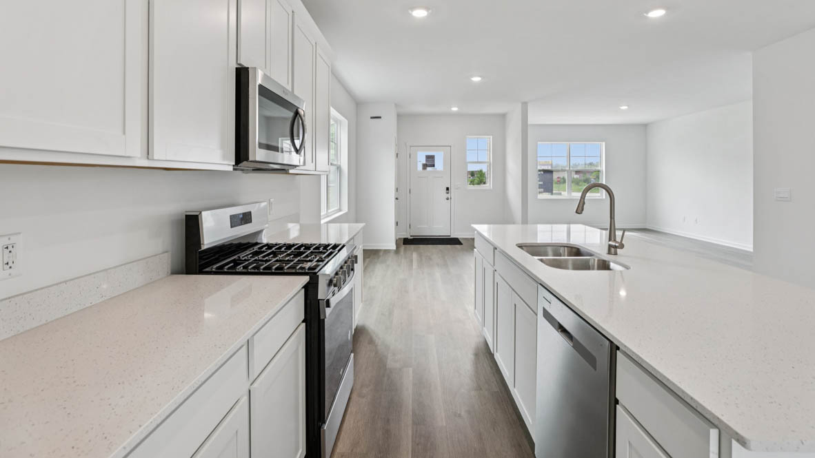 kitchen island with sink and dishwasher