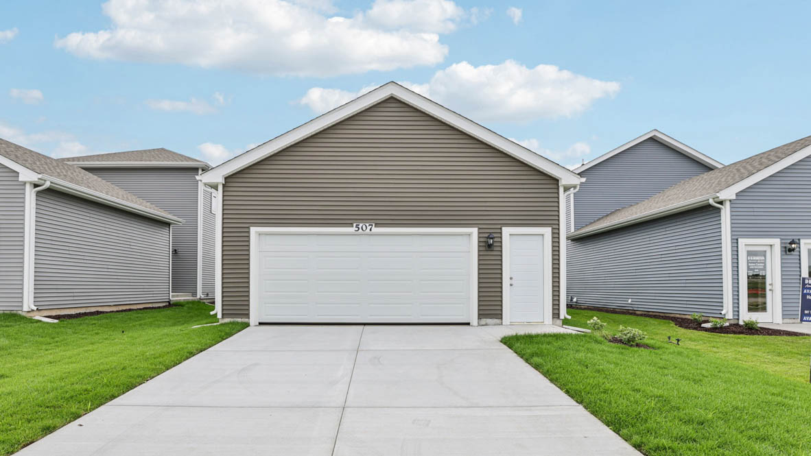 Rear garage with door entrance