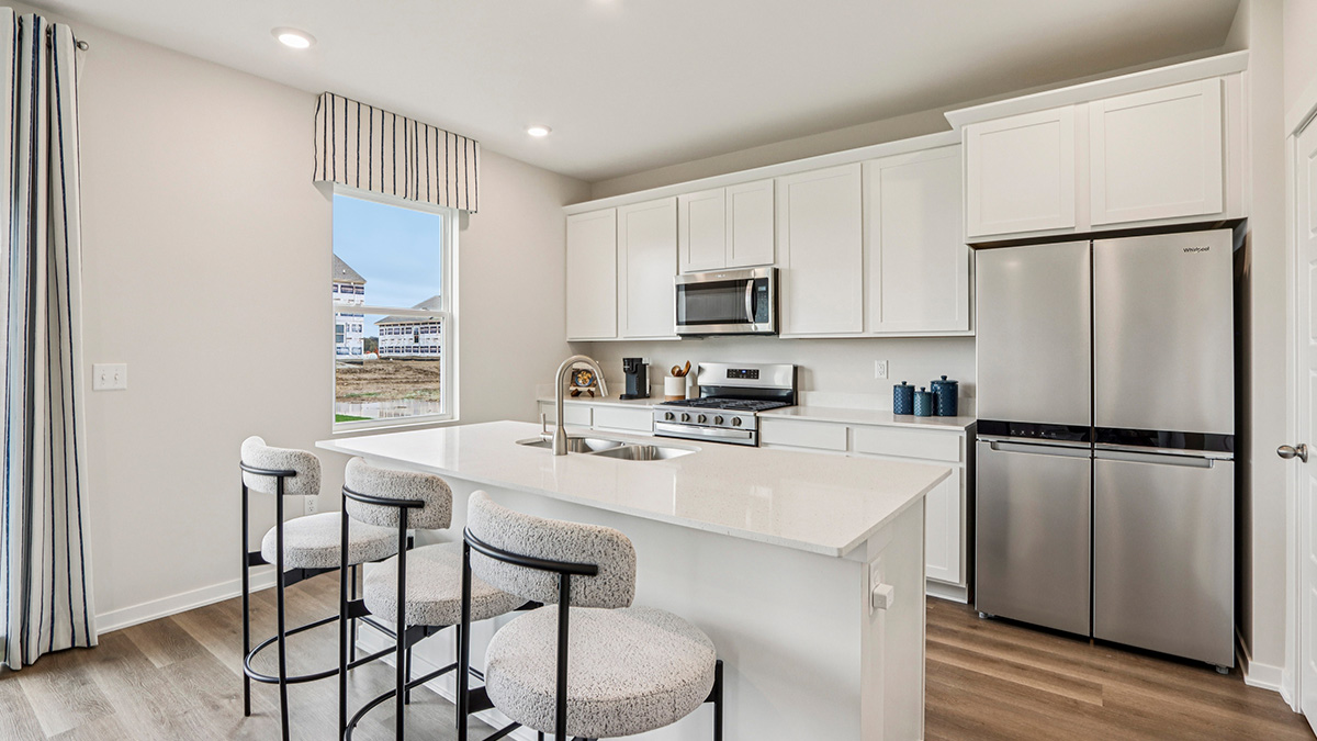 open concept kitchen with stainless steel appliances