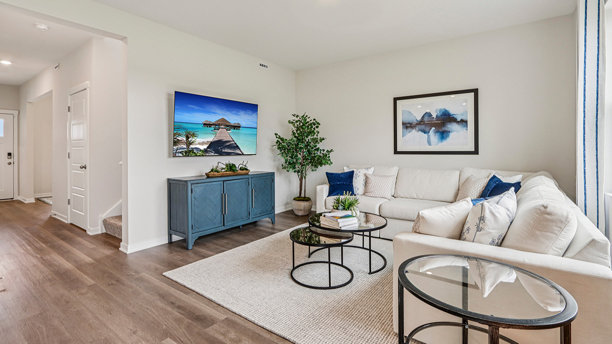 open concept living room with vinyl flooring