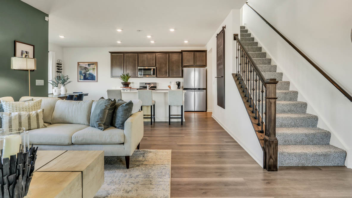 Great room with staircase  leading up to upstairs