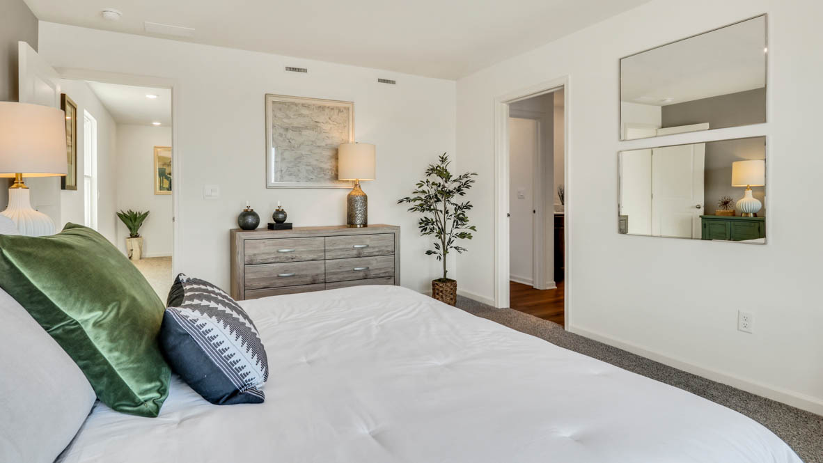 Primary bedroom with connecting en suite