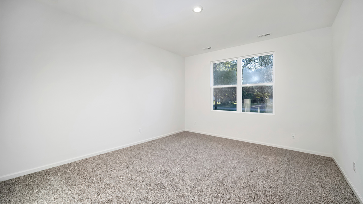 bedroom with carpeted flooring