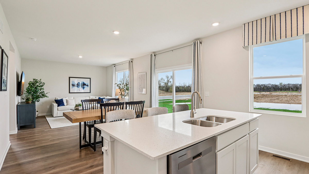 open concept kitchen with stainless steel appliances
