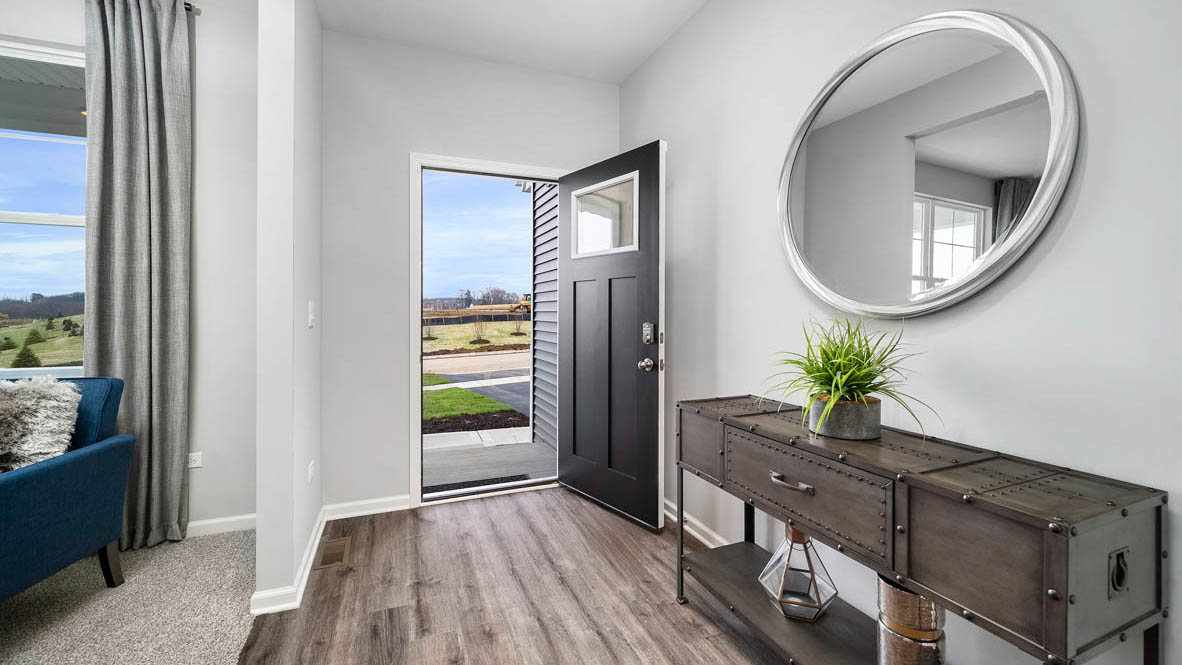 front door and hallway of a single family home