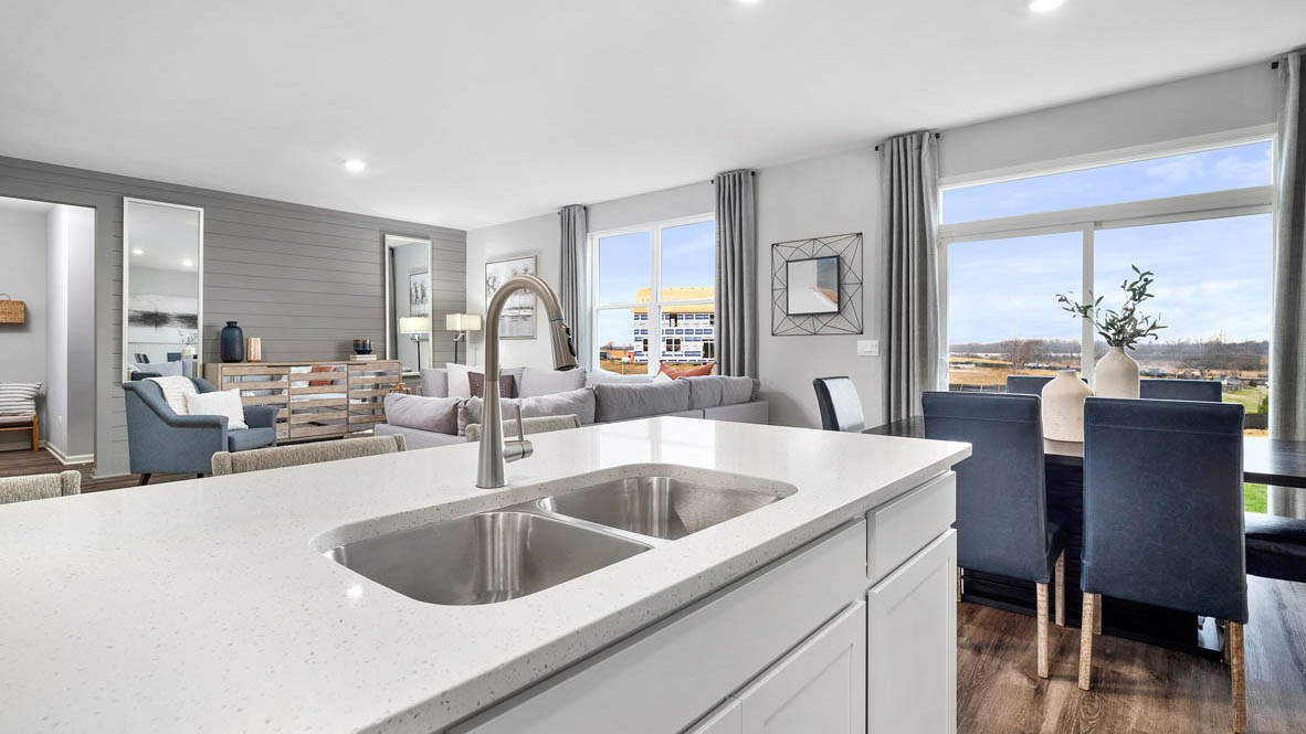 kitchen island overlooking the open concept living room