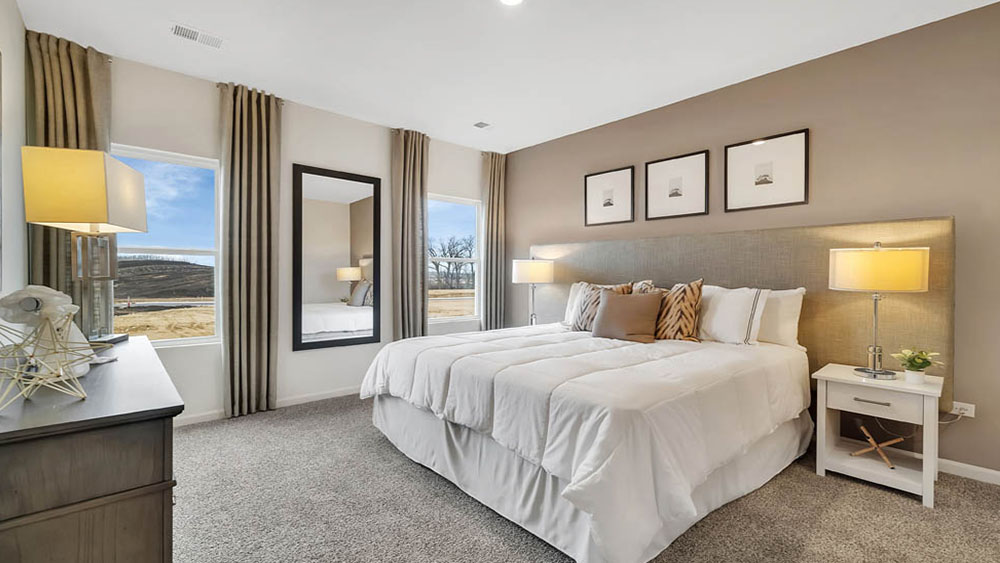 Primary bedroom off of great room and kitchen