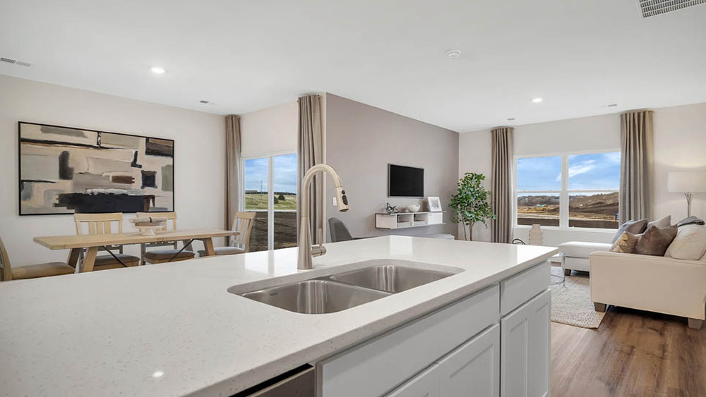 Large kitchen island overlooking the dining room area