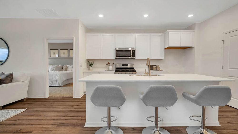 Kitchen with pantry and large island overhang
