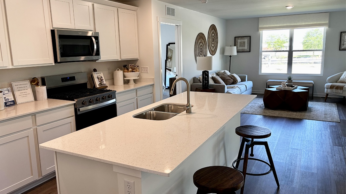 kitchen with white cabinets and quartz countertops