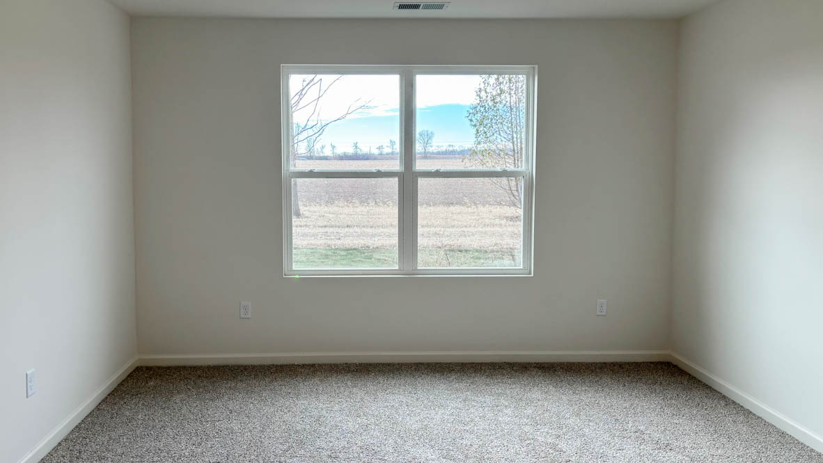 secondary bedroom with large window