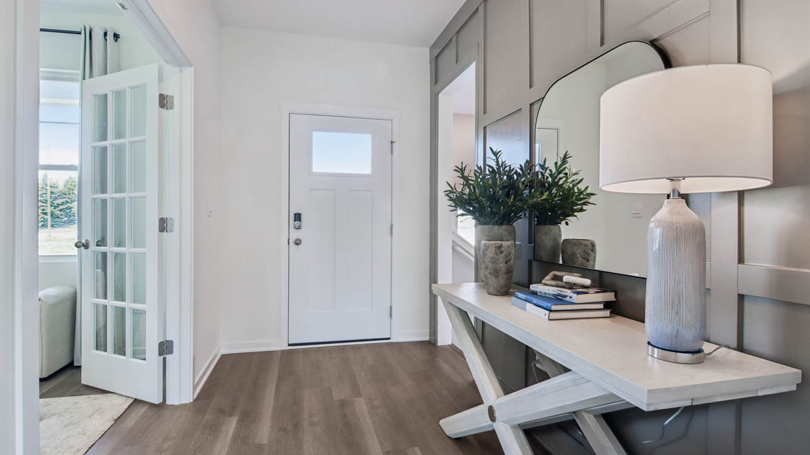 front door and hallway of a single family home